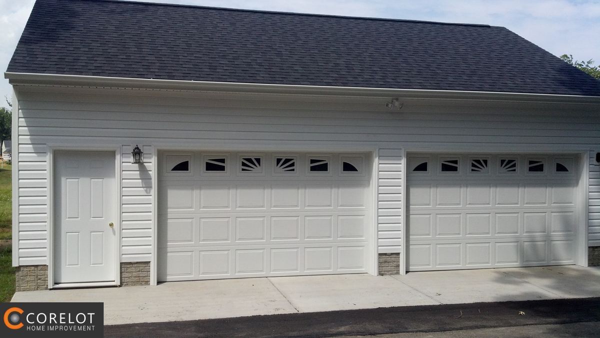 Three-bay detached garage with carriage-style doors